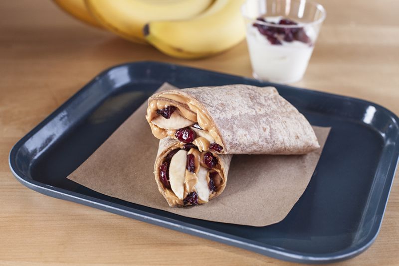 PEANUT BUTTER, BANANA & CRANBERRY ROLL-UPS